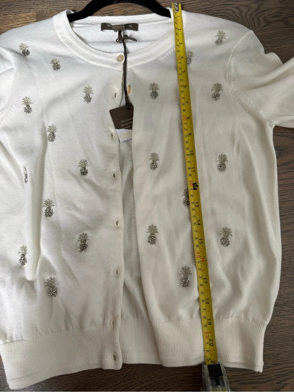 Tommy Bahama Cream Button-Front Pima Cotton Top with pineapple embellishments.